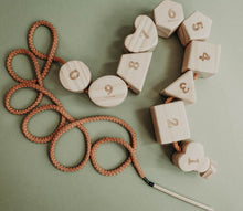 Load image into Gallery viewer, Wooden lacing toy with numbers and geometry shapes