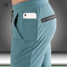 Load image into Gallery viewer, Joggers Sweatpants Men Casual Pants New Solid Color Gyms Fitness